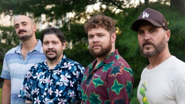 4 men standing together