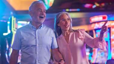 Two older people in a casino