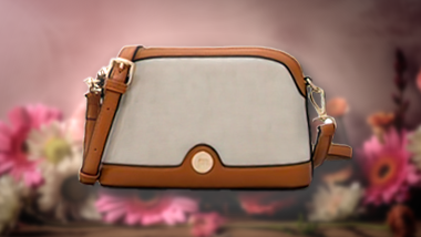 A purse. Flowers behind it